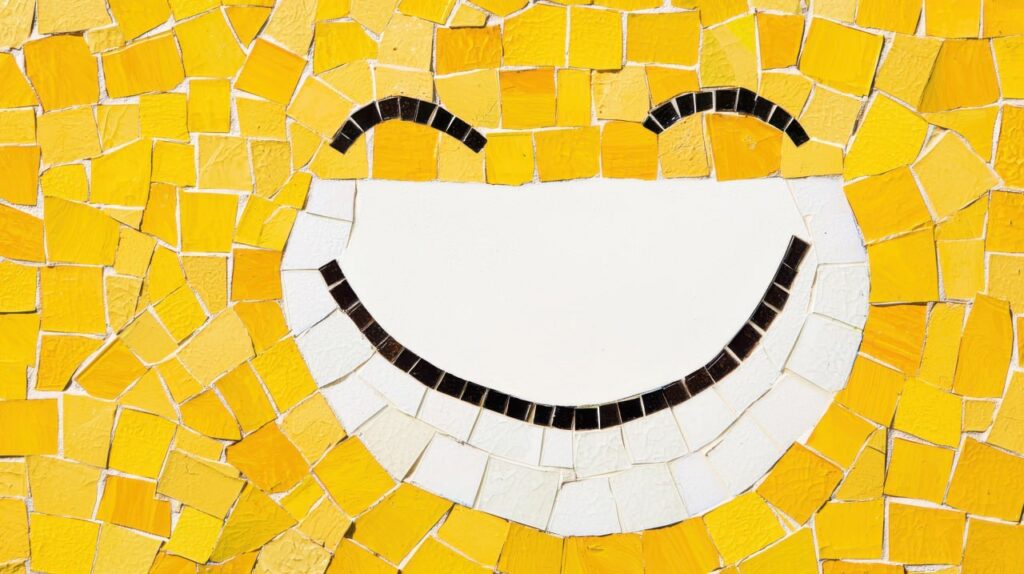 Mosaico amarillo con cara sonriente